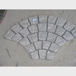 light grey cube on mesh-fan shape